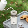 Timemore Crystal Eye Vacuum Travel Brewer brewing coffee on the go
