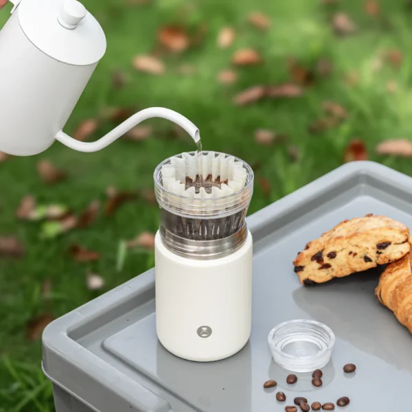 Timemore Crystal Eye Vacuum Travel Brewer brewing coffee on the go